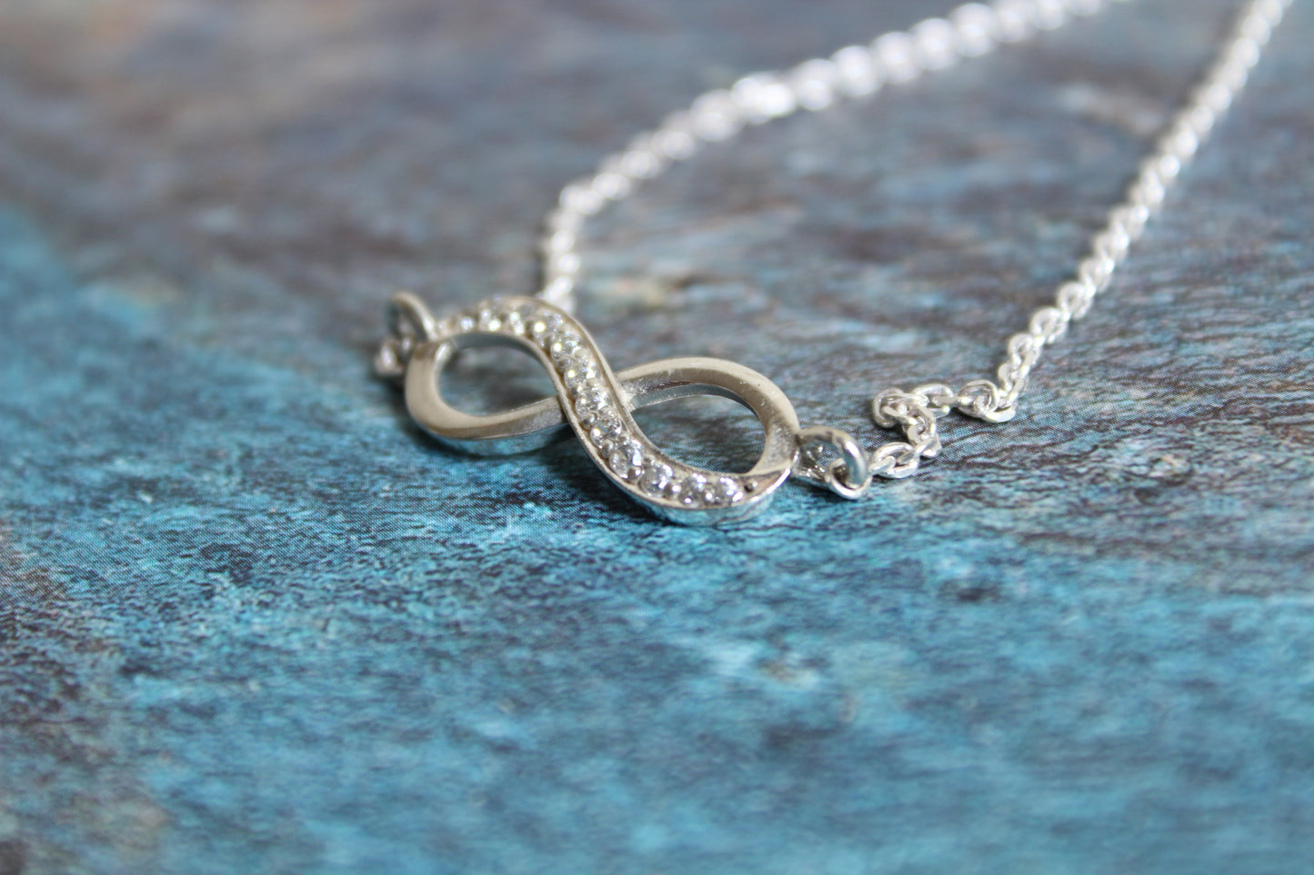 Silver Infinity Bracelet with Stone